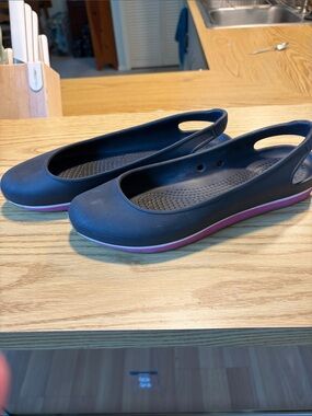 CROCS Black Slip-On Flats with Pink Trim